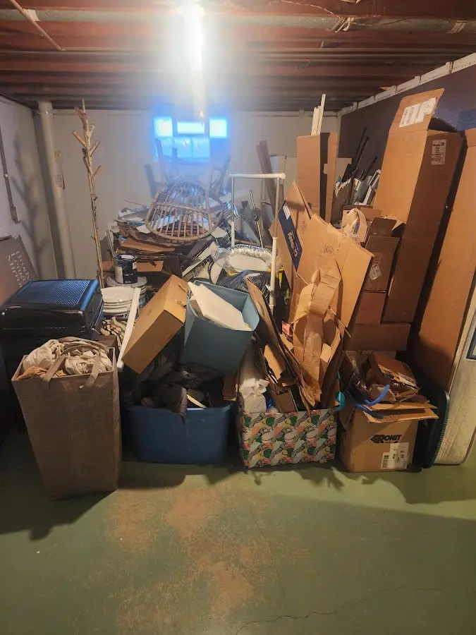 Roll-off dumpster container at job site for Construction Dumpster Rental in Bartlett